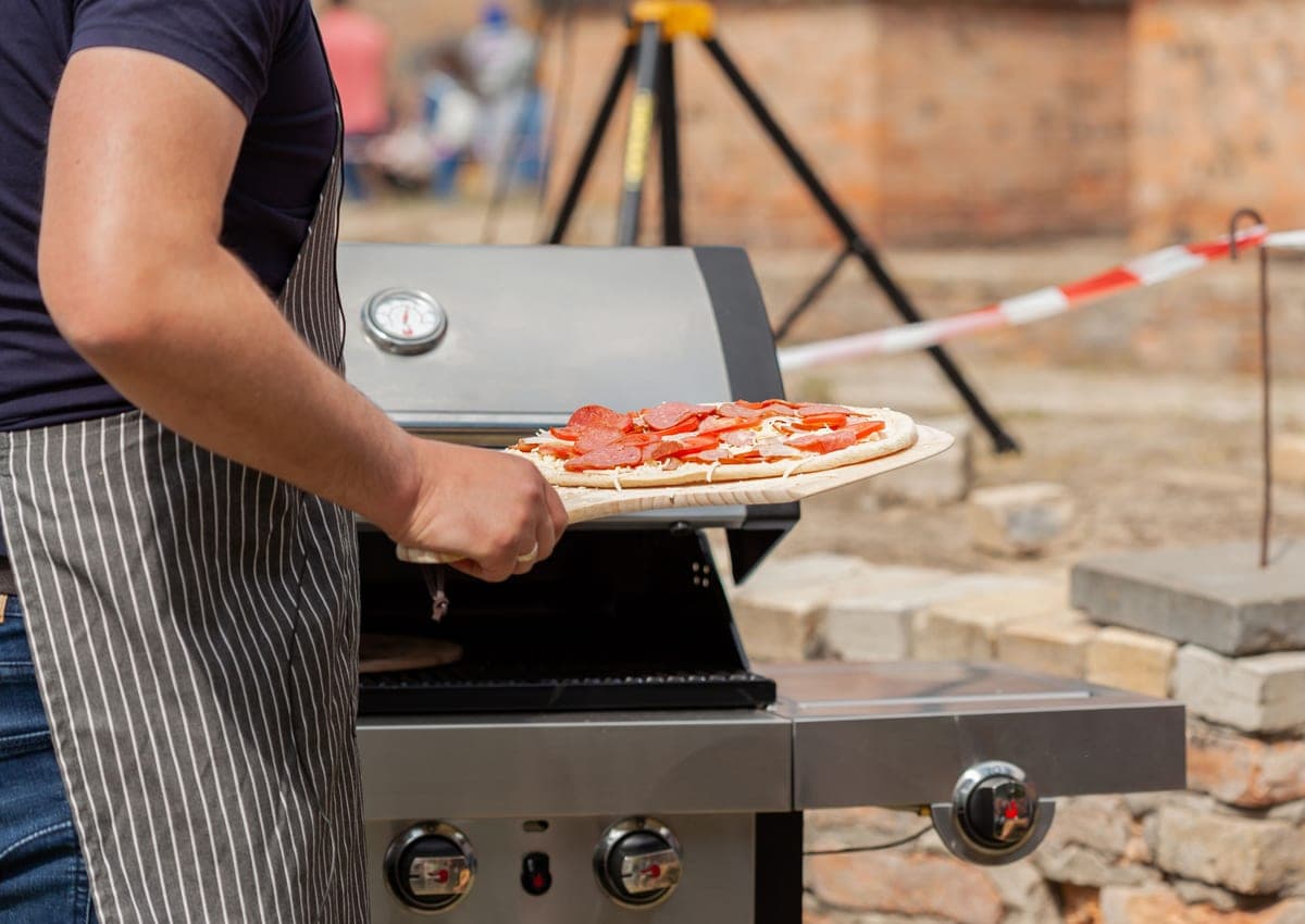 A gas pizza oven on a patio