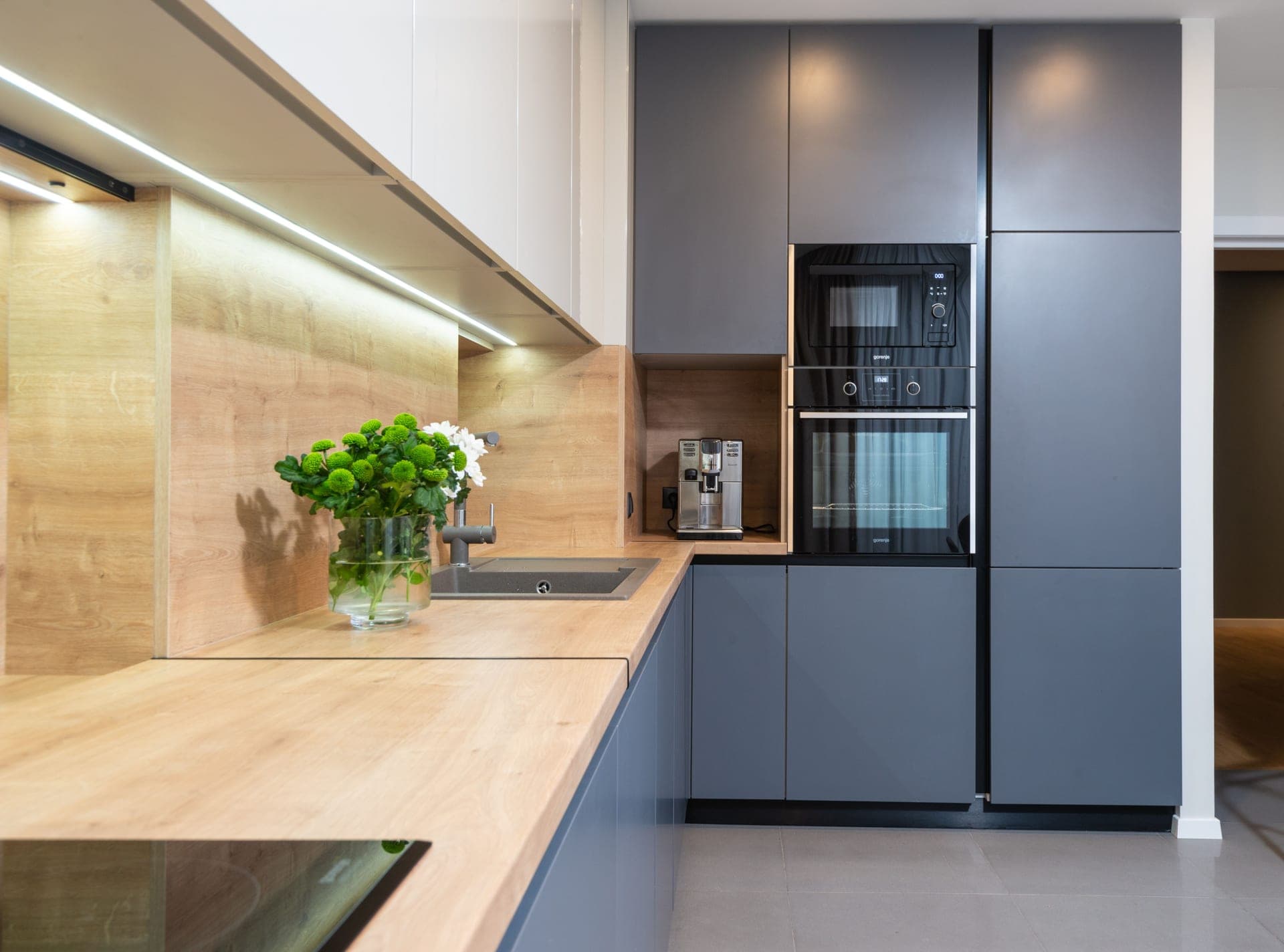 A countertop electric oven in a bright modern kitchen