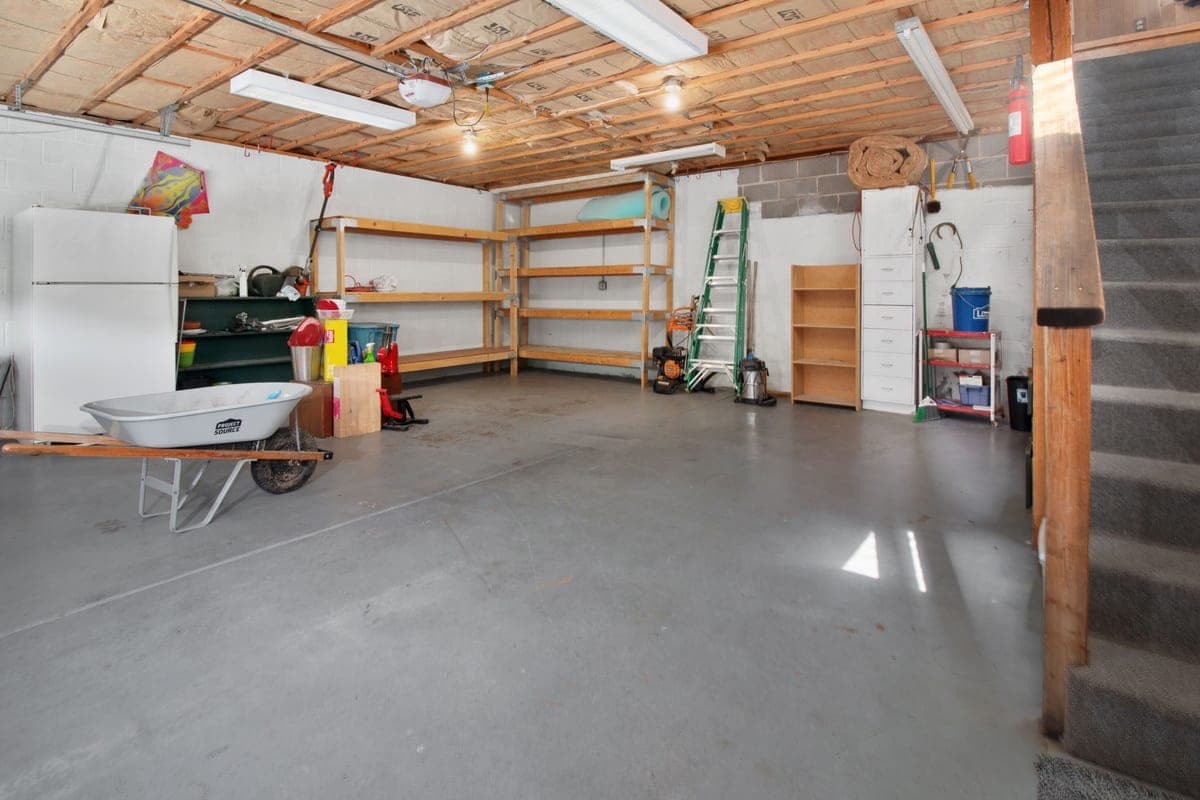 Organized storage shelving in a garage